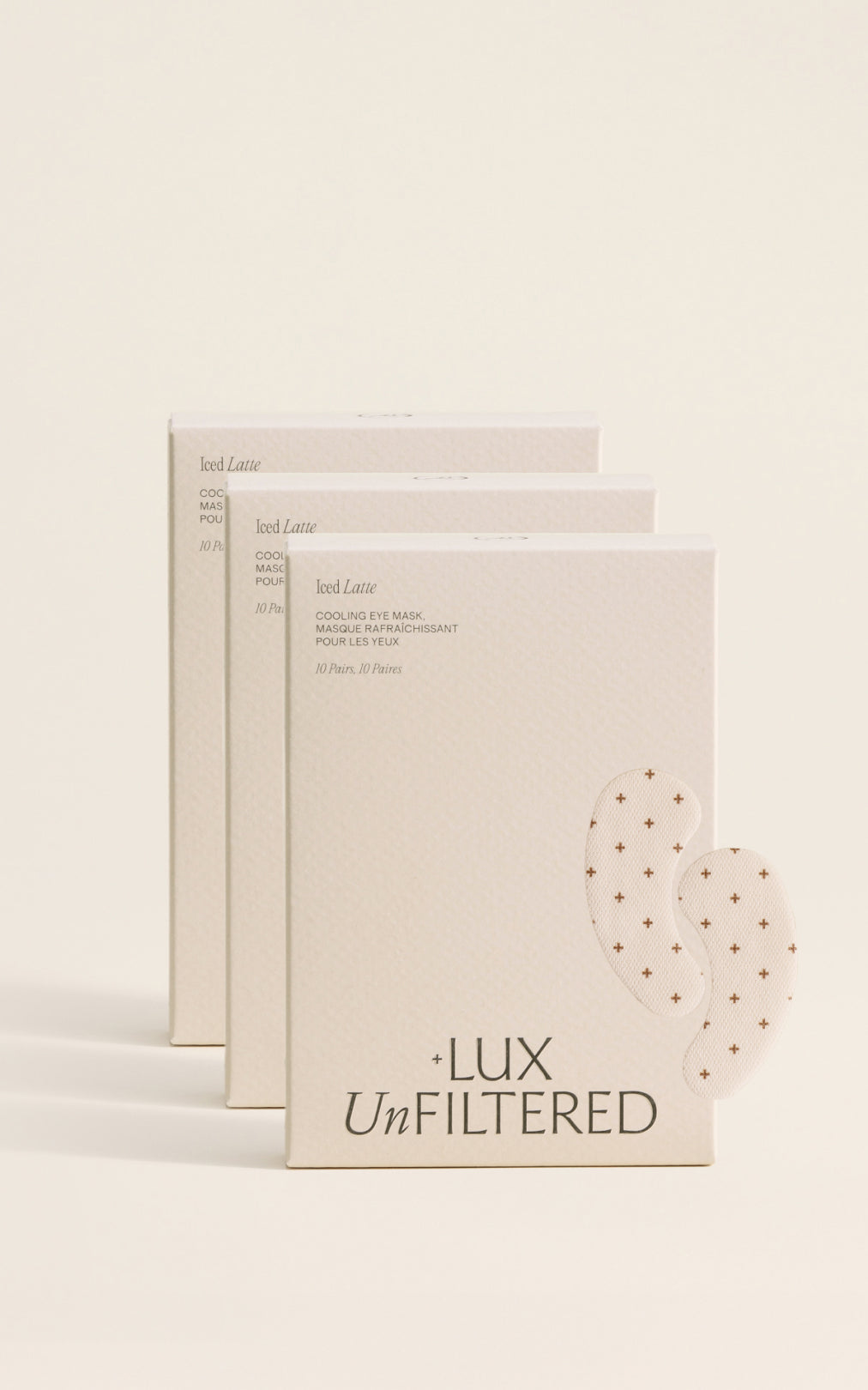 + LUX UnFILTERED stacked boxes labeled Iced Latte — COOLING EYE MASK MASQUE RAFRAICHISSANT POUR LES YEUX 10 Pairs, 10 Paires