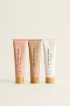 +LUX UNFILTERED tubes labeled N°32 SELF-TANNING CREAM; N°10 BLURRING BODY GLOW; N°14 BODY CREAM; SANTAL; 100 ml / 3.4 fl oz